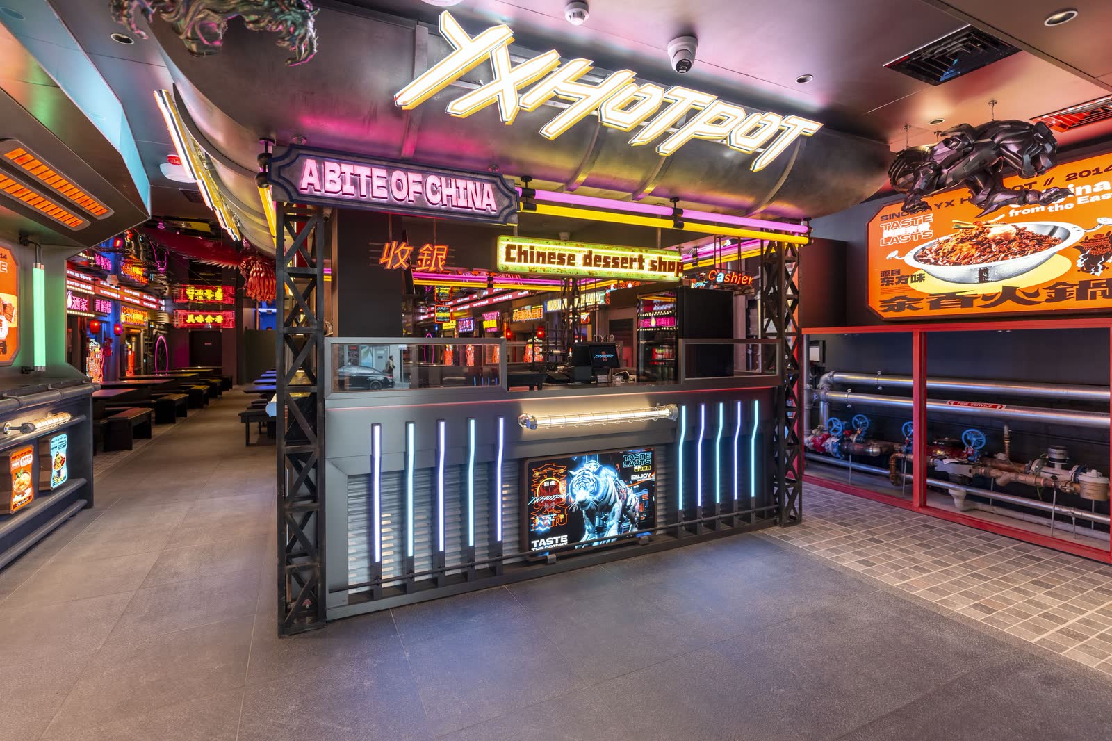 A neon-lit food hall counter styled as a Chinese street market