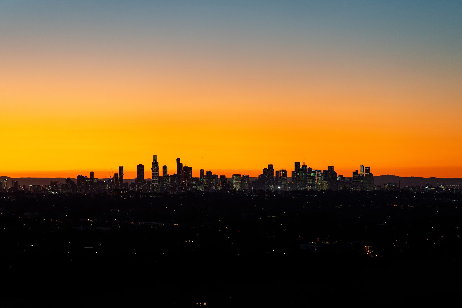 Melbourne city skyline at sunset, photographed by Jordy Scott