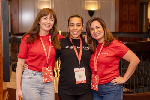 Conference crew in branded shirts and lanyards during a Melbourne summit
