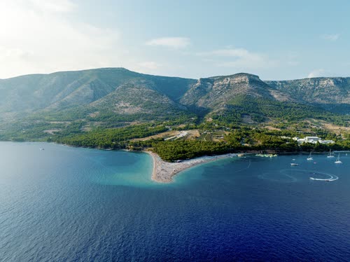 Aerial view of the Zlatni Rat spit reaching into the Adriatic at Bol, Croatia