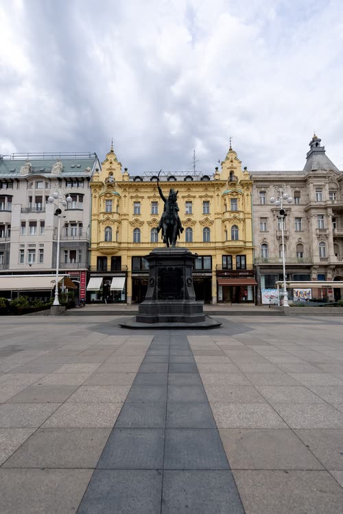 The equestrian statue and yellow facades of Ban Jelacic Square, Zagreb