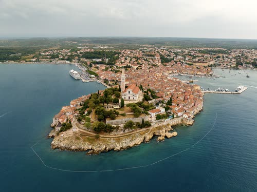 Aerial view of Rovinj old town and its church tower on the Istrian coast