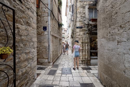 A narrow stone alley in the old town of Split, Croatia