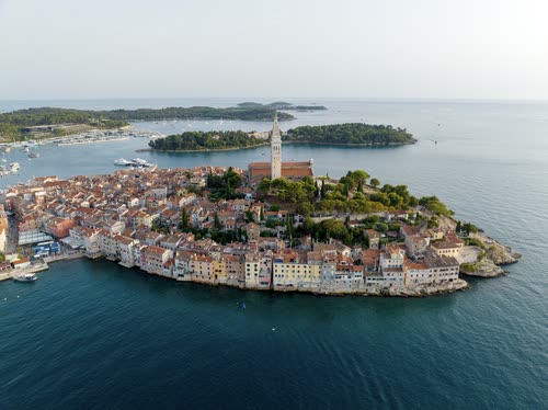 Aerial view of the old town of Rovinj on its peninsula with its bell tower, Croatia