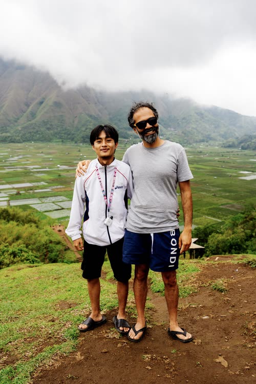 Jordy Scott with a local guide on a ridge above the Sembalun valley, Lombok