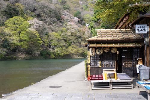 A traditional riverside teahouse on the Hozu River at Arashiyama, Kyoto