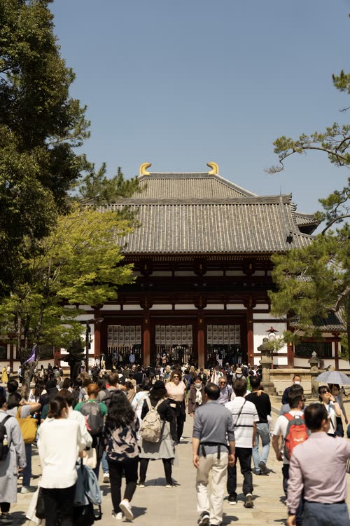 Visitors streaming through the great gate on the approach to Todai-ji, Nara