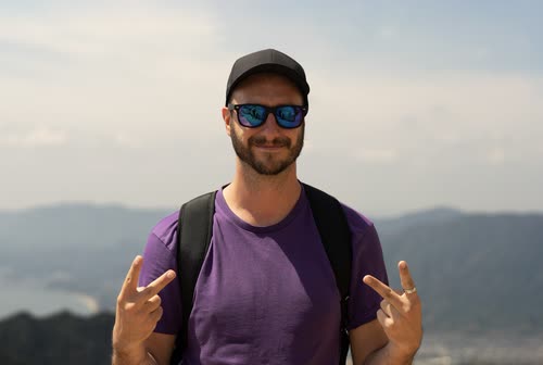 Jordy Scott at a mountain lookout above the hazy Seto Inland Sea