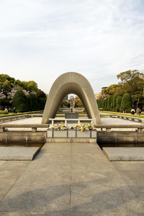 The arched Memorial Cenotaph and its wreaths in Hiroshima Peace Memorial Park