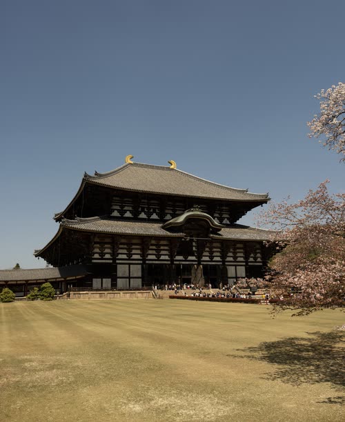 The Daibutsuden of Todai-ji rising beyond its open gravel court, Nara
