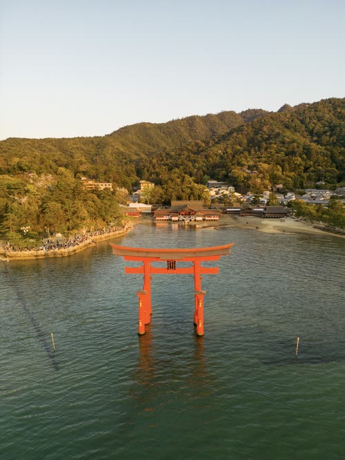 The floating torii gate of Itsukushima Shrine standing in the sea at Miyajima