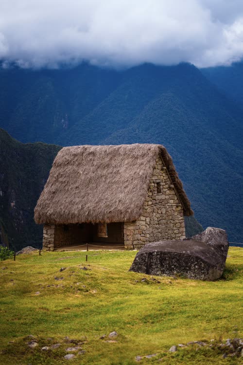 The thatched guardhouse standing above the terraces at Machu Picchu