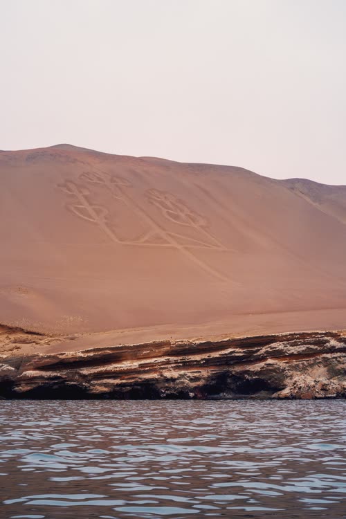 The Paracas Candelabra geoglyph carved into a coastal dune, Peru