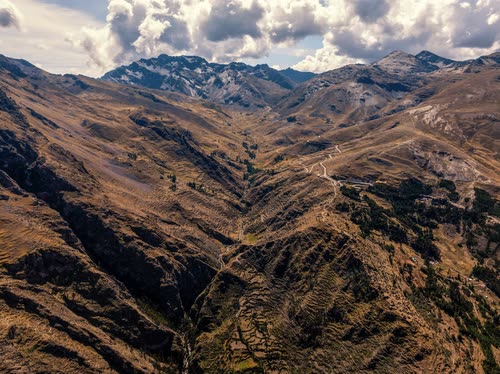 Bare folded ridges of the high Andes under a heavy sky