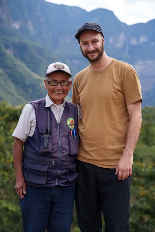 Jordy Scott with a local guide in front of the mountains of northern Peru