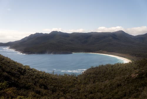 The curve of Wineglass Bay below the Hazards, Freycinet, Tasmania
