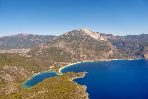Aerial view of the Oludeniz blue lagoon and its spit below Babadag, Turkey