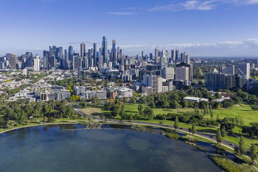 Aerial view over Albert Park Lake toward the Melbourne CBD