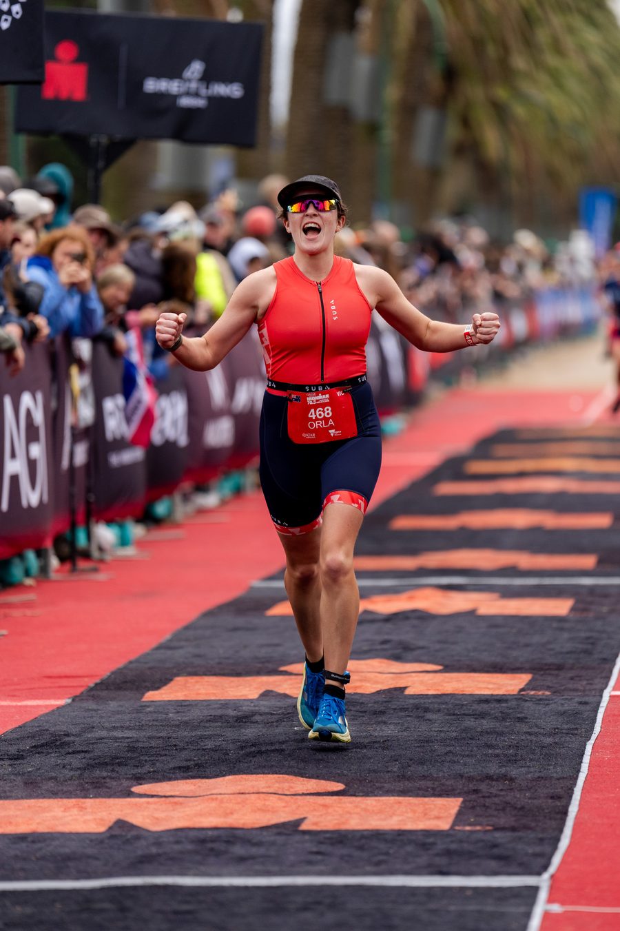 Athlete crossing the Ironman Melbourne finish line