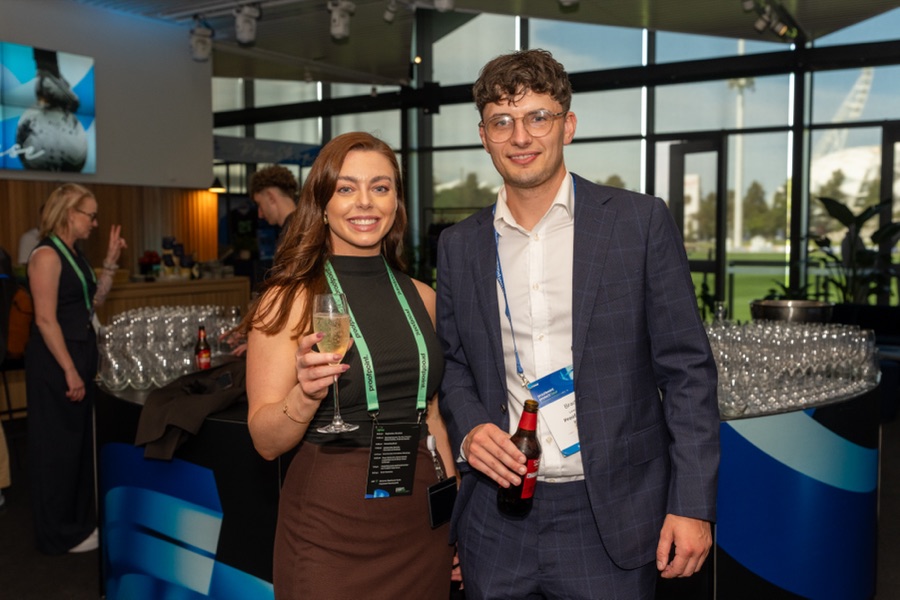 Guests at the networking drinks after an AI conference in Melbourne
