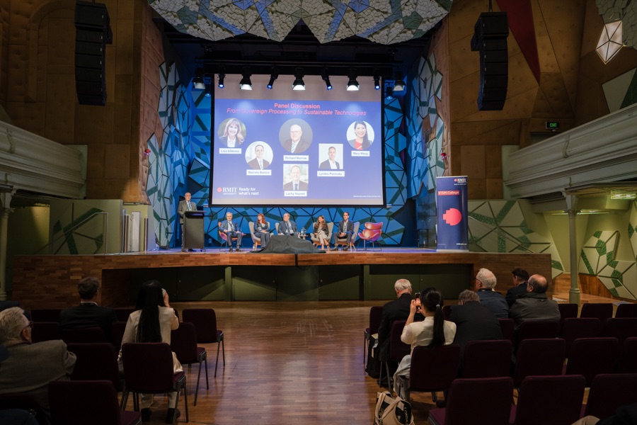 Panel on stage in the forum auditorium, Melbourne