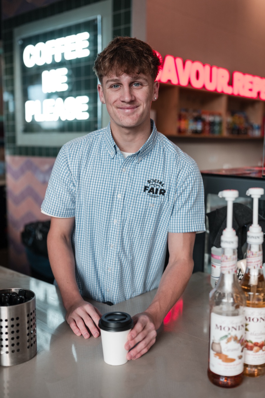Barista at the Social Fair coffee counter