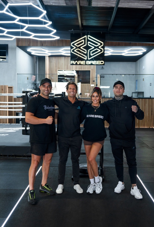 A gym team of four photographed together on the training floor